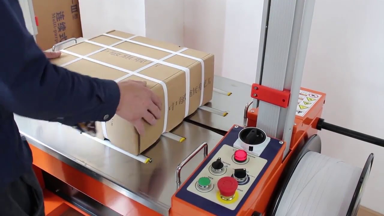 Mesin Strapping Karton WPM X201 - Solusi Otomatis untuk Pengemasan Efisien